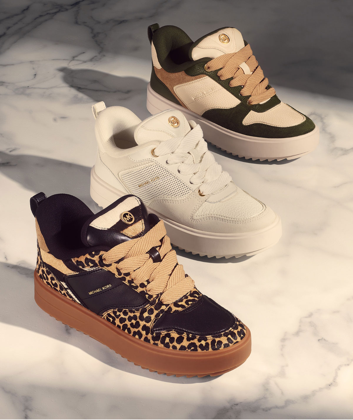 WORK THE RUMI With mixed prints and tons of texture, the Rumi sneaker is a playful addition to any ensemble.