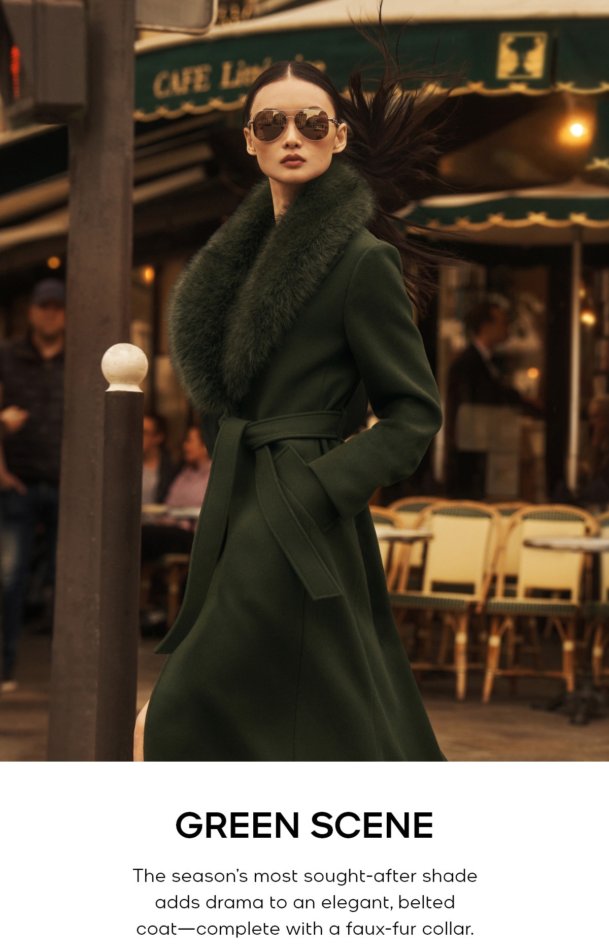 Green Scene The season’s most sought-after shade adds drama to an elegant, belted coat—complete with a faux-fur collar.